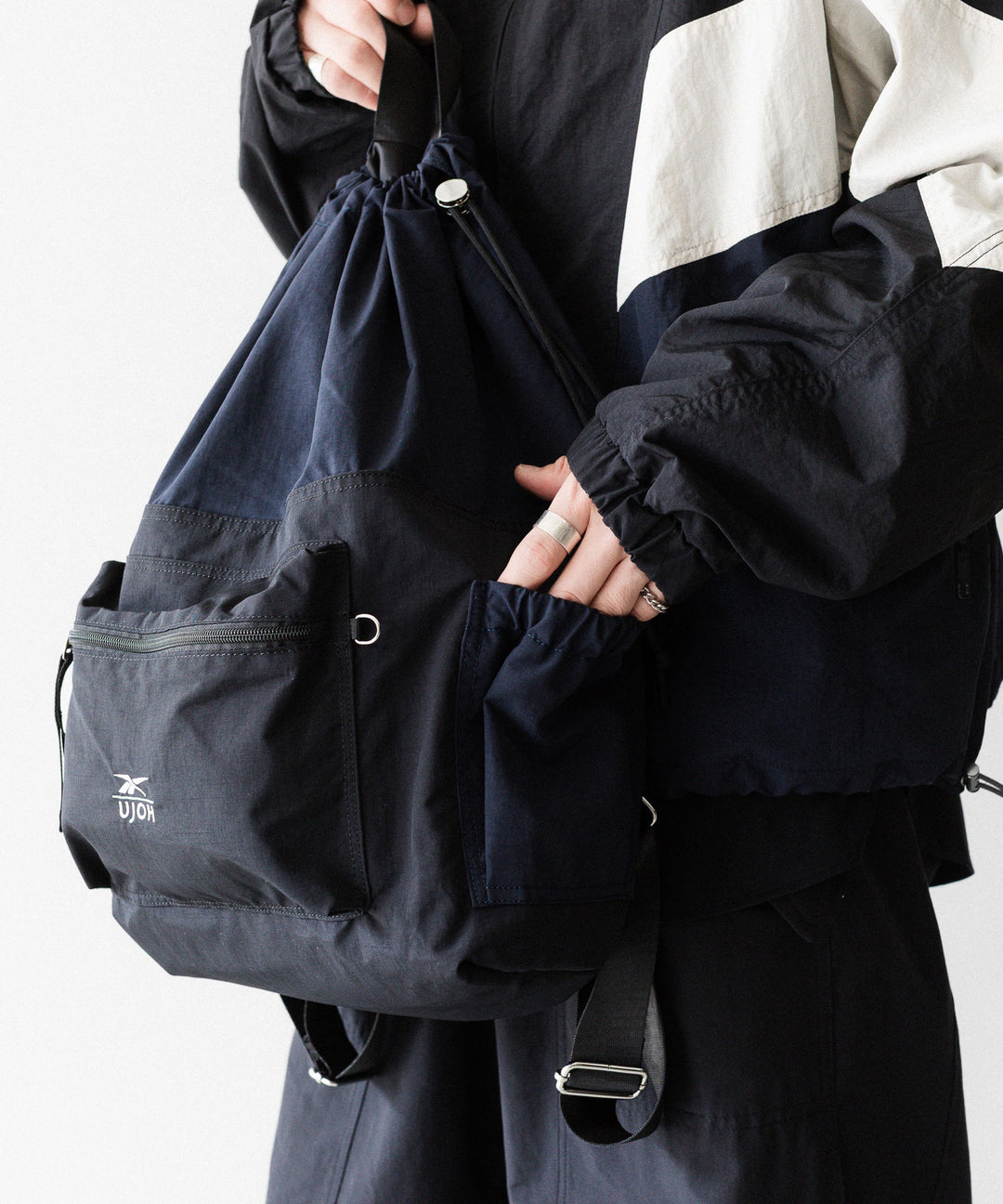UJOH(ウジョー)×Reebok(リーボック)のDRAW CORD BAG - BLACKの公式通販サイトsession福岡セレクトショップ
