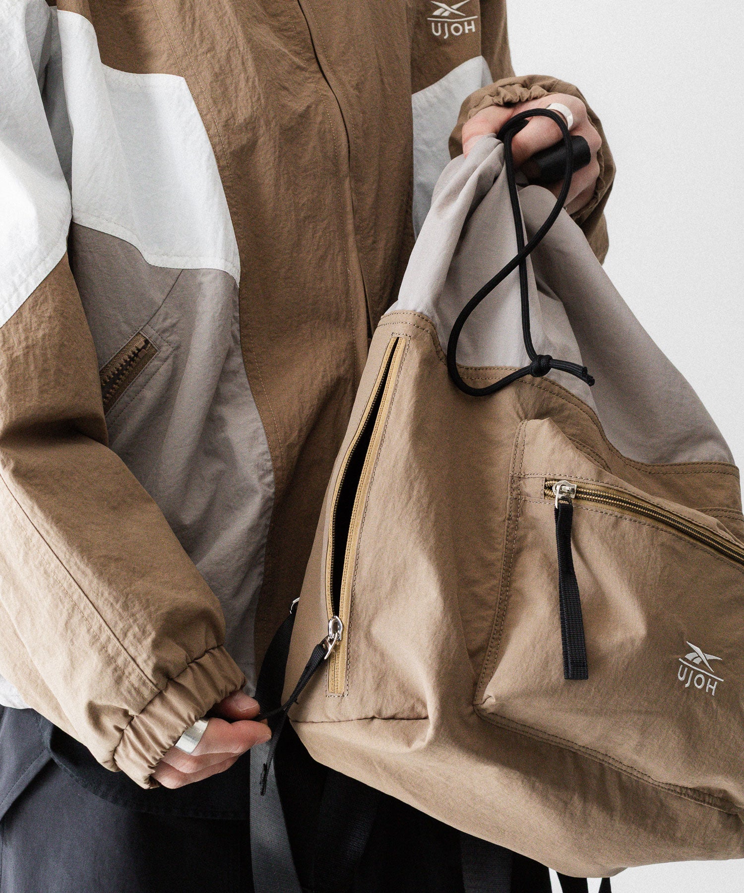 UJOH × Reebok】DRAW CORD BAG - BEIGE | 公式通販サイト session