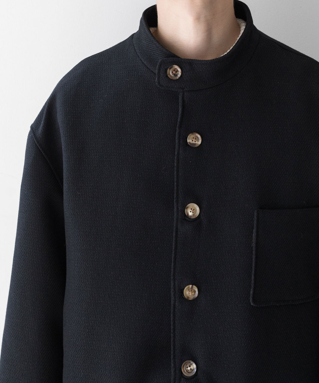 INTÉRIM(インテリム)の23AWコレクションLIMITED DIAGONAL COATIONG TWILL FORESTIEREのBLACK