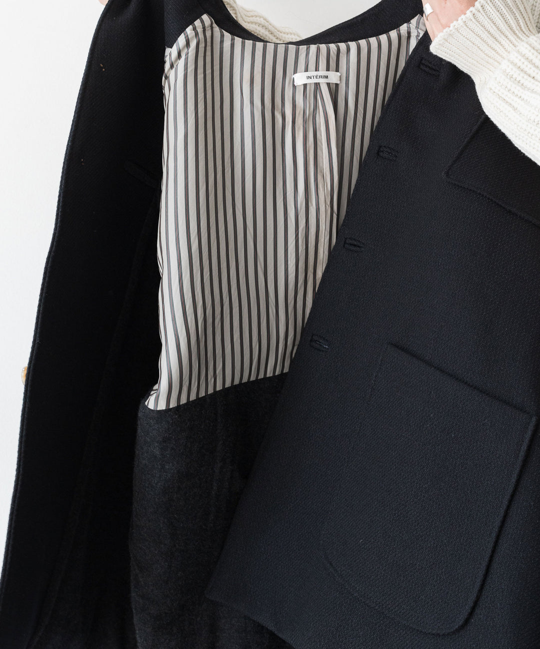 INTÉRIM(インテリム)の23AWコレクションLIMITED DIAGONAL COATIONG TWILL FORESTIEREのBLACK