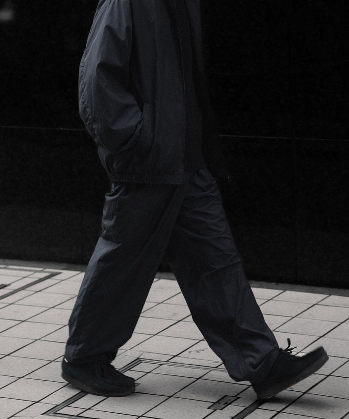 【ssstein × UMBRO】CO/NY POPLIN TRACK TROUSERS - BLACK