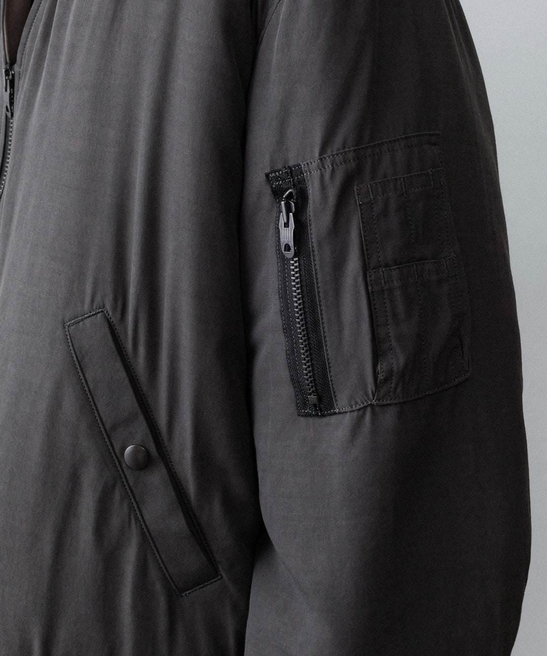 ANTHEM A-アンセムエーのPIGMENT AND DYE PUFFER MILITARY BLOUSONのDUSTY BLACK