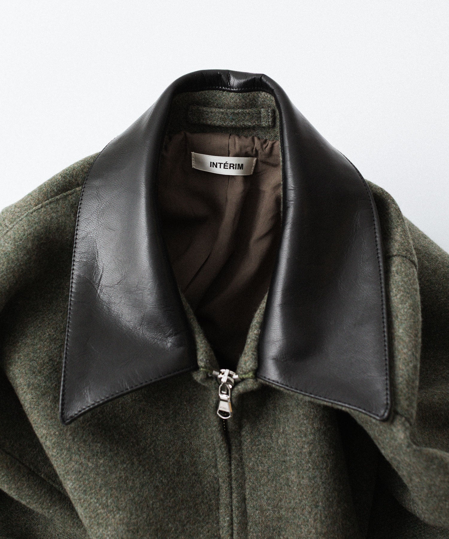 INTÉRIM - インテリムのHEAVY DOUBLE FACED MELANGE WOOL FELT DEAD STOCK LEATHER COLLAR HARRINGTON JACKETのSAGE公式通販サイトsession福岡セレクトショップ