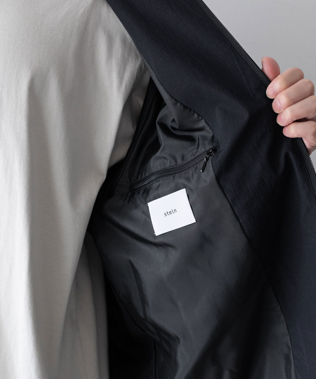 stein(シュタイン)の23AWコレクションWINDBREAKER STAND COLLAR JACKETのBLACK
