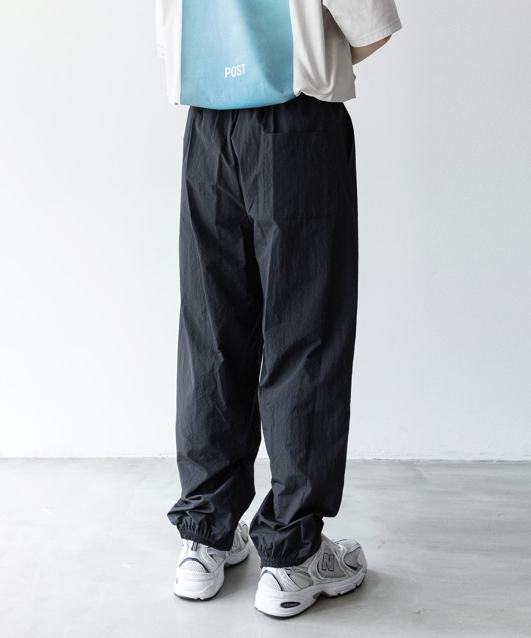 stein(シュタイン)の23AWコレクションWINDBREAKER EASY TROUSERSのBLACK