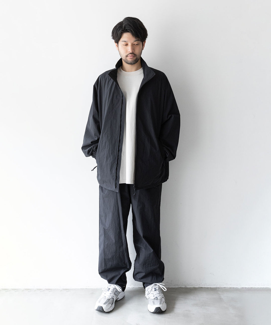 stein(シュタイン)の23AWコレクションWINDBREAKER EASY TROUSERSのBLACK