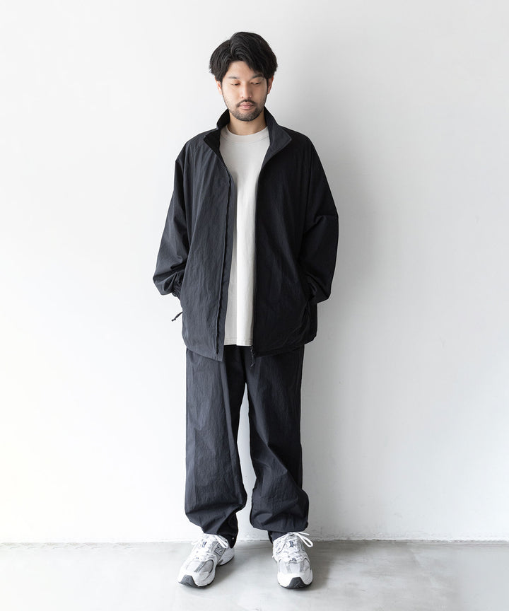 stein(シュタイン)の23AWコレクションWINDBREAKER EASY TROUSERSのBLACK