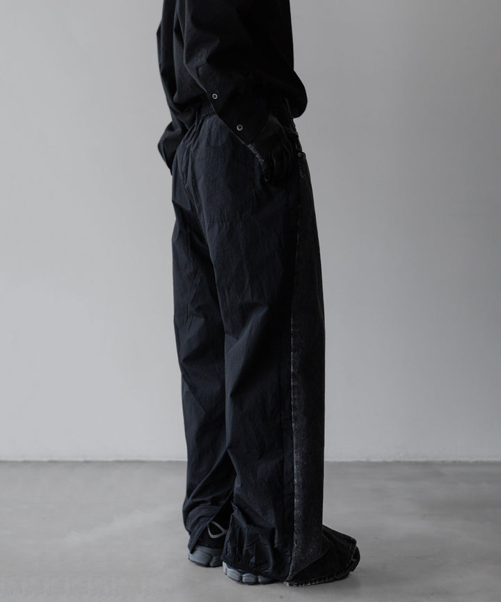 stein(シュタイン)の24SSコレクションNYLON COMBINATION CHEMICAL BLEACHED DENIM JEANSのBLACK