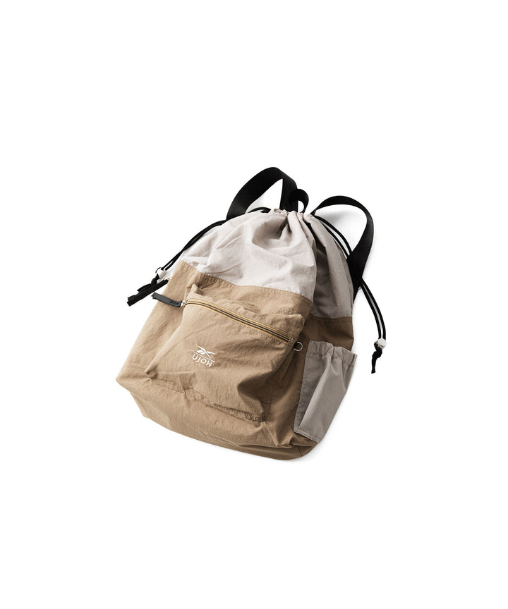 UJOH((ウジョー)×Reebok(リーボック)のDRAW CORD BAGのBEIGE 公式通販サイトsession福岡セレクトショップ