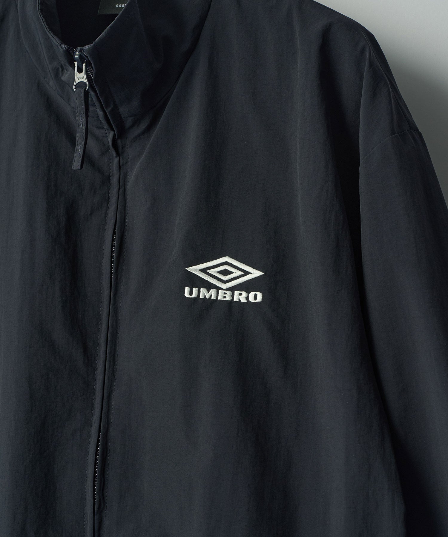 ssstein × UMBRO】CO/NY POPLIN TRACK JACKET - DARK NAVY | 公式通販