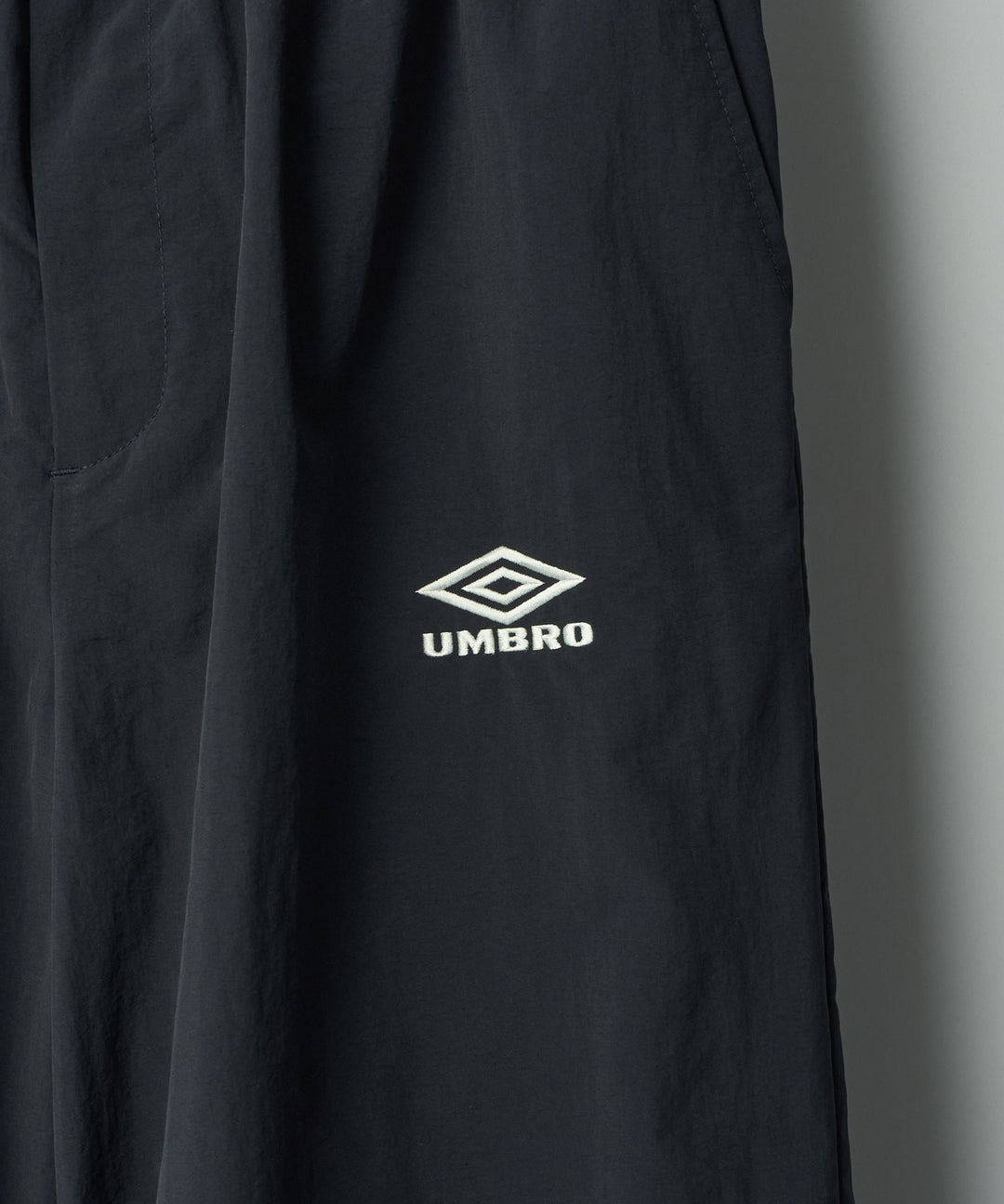 【ssstein × UMBRO】CO/NY POPLIN TRACK TROUSERS - DARK NAVY