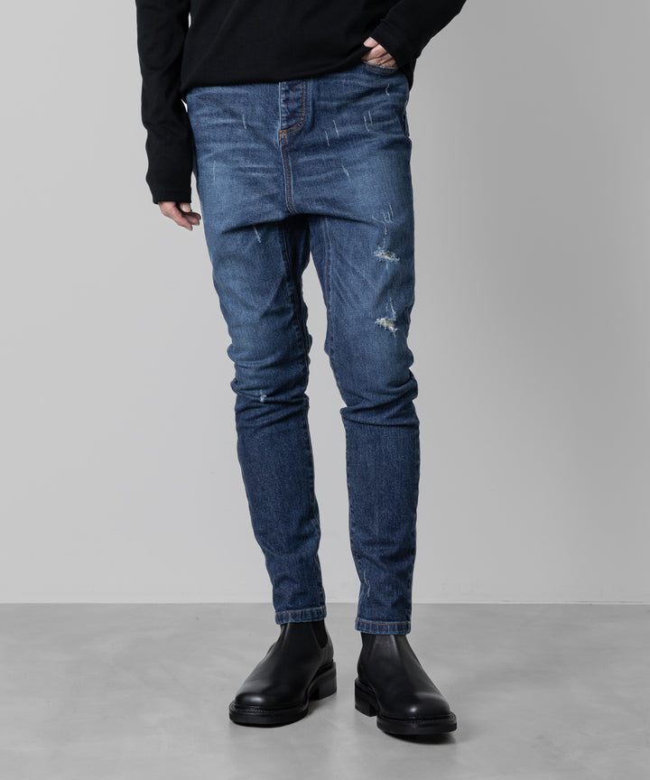 ato(アトウ)の23awコレクションのDAMAGED STRETCH SARROUEL DENIM PANTSのNAVY