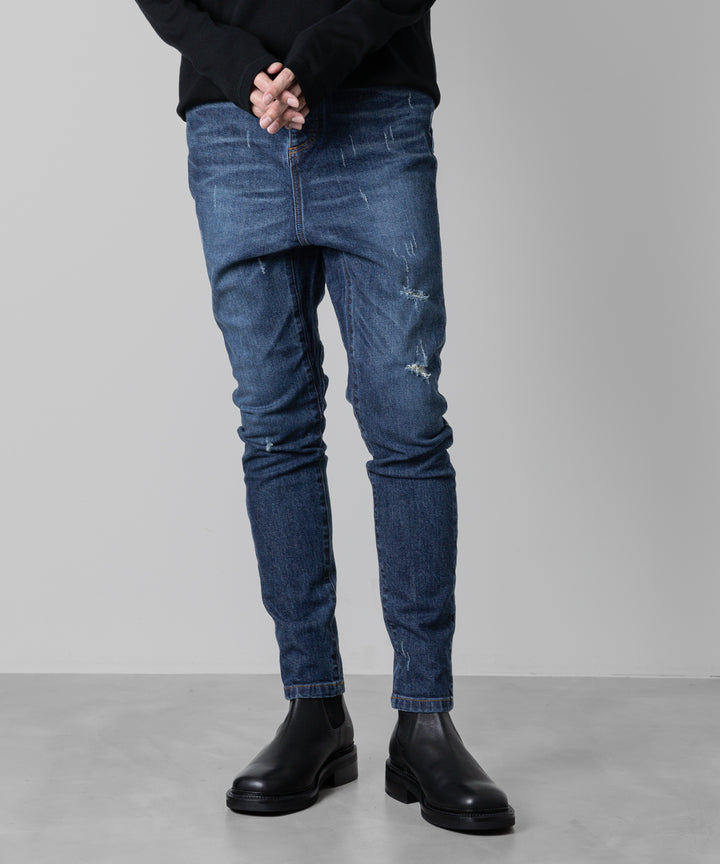 ato(アトウ)の23awコレクションのDAMAGED STRETCH SARROUEL DENIM PANTSのNAVY