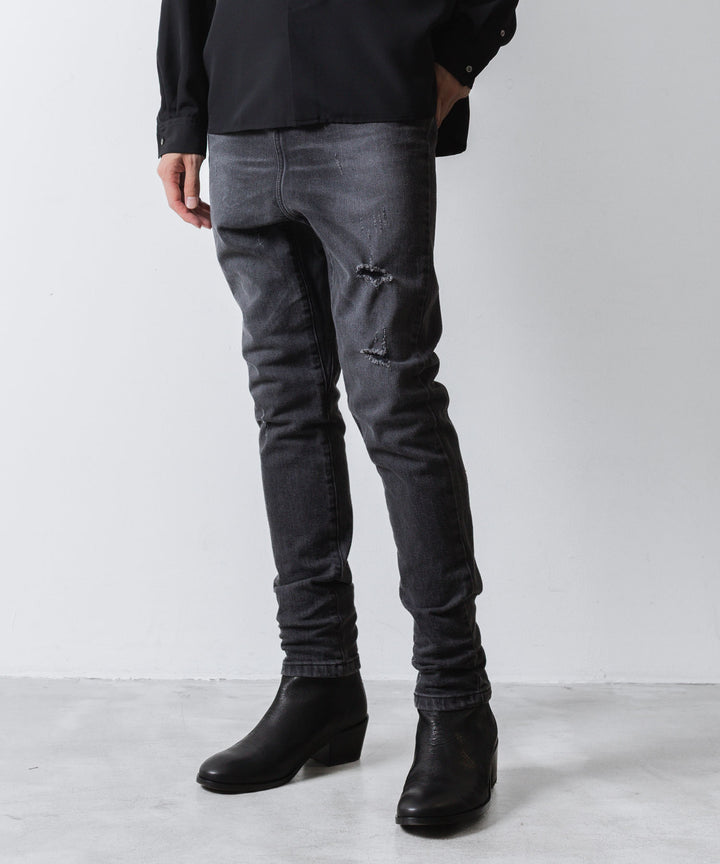 ato(アトウ)の23awコレクションのDAMAGED STRETCH SARROUEL DENIM PANTSのBLACK