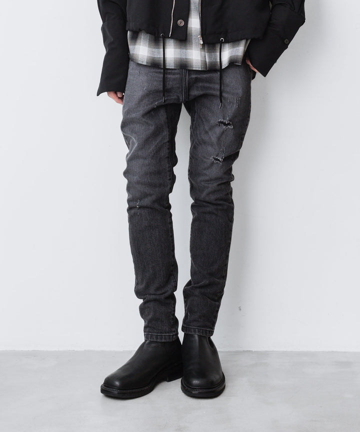 ato(アトウ)の23awコレクションのDAMAGED STRETCH SARROUEL DENIM PANTSのBLACK