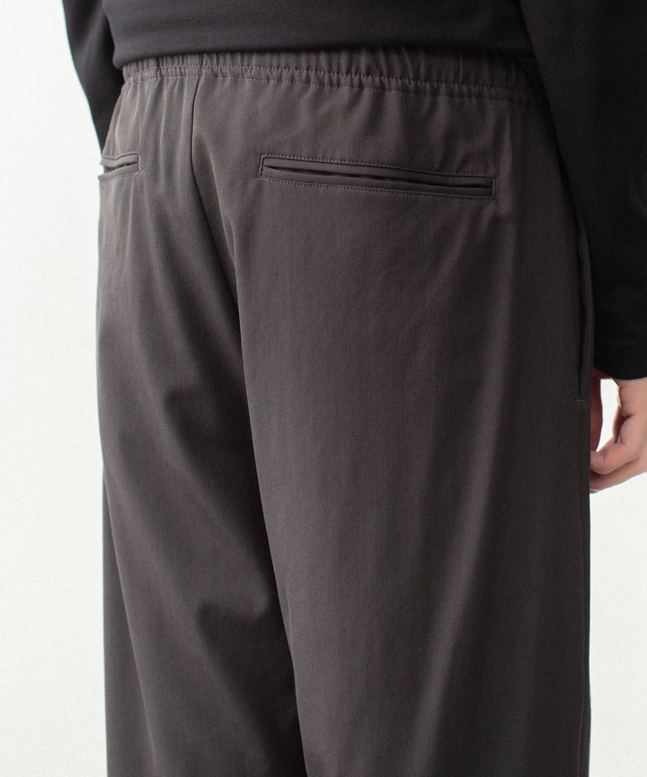 ATTACHMENT アタッチメントのWASHABLE HIGH TWIST GABARDINE EASY BUCKLE BALLOON TROUSERS - KHAKI GRAYの公式通販サイトsession福岡セレクトショップ