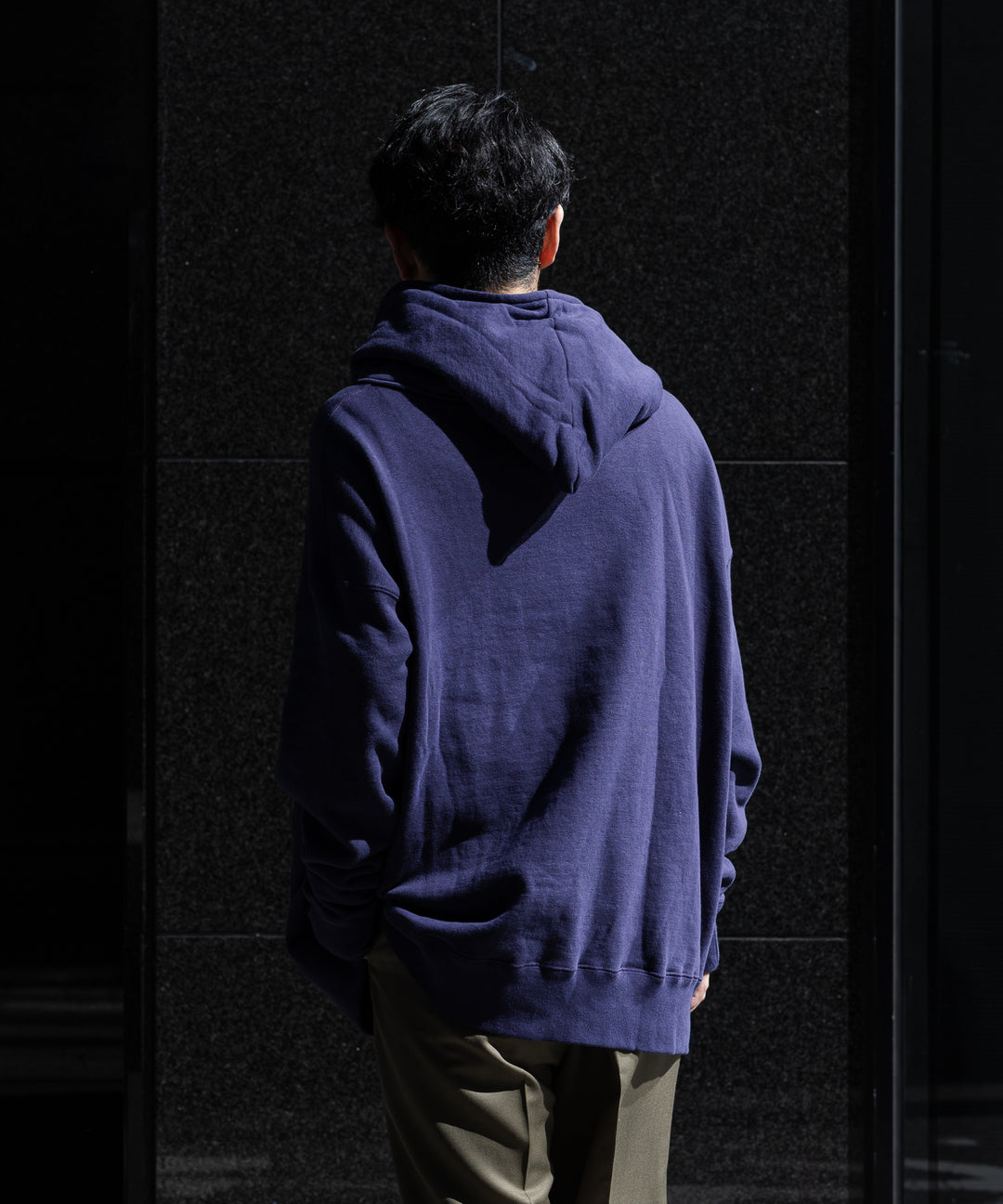 INTERIM(インテリム)の22AWコレクションのHYPER BIG LOOP WHEEL SIDE SEAMLESS AFTER HOODED SWEAT PARKAのNASU