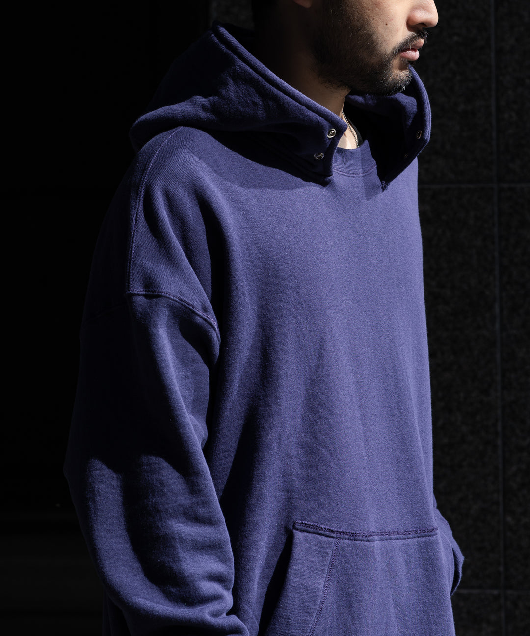 INTERIM(インテリム)の22AWコレクションのHYPER BIG LOOP WHEEL SIDE SEAMLESS AFTER HOODED SWEAT PARKAのNASU