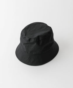INTÉRIM(インテリム)のバケットハット UK OILED CLOTH BUCKET HAT - BLACK