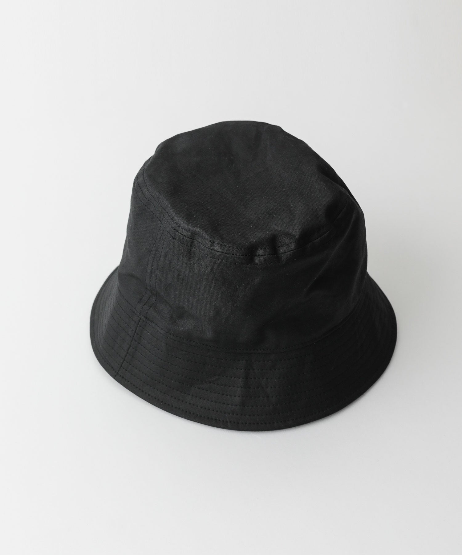 INTÉRIM(インテリム)のバケットハット UK OILED CLOTH BUCKET HAT - BLACK