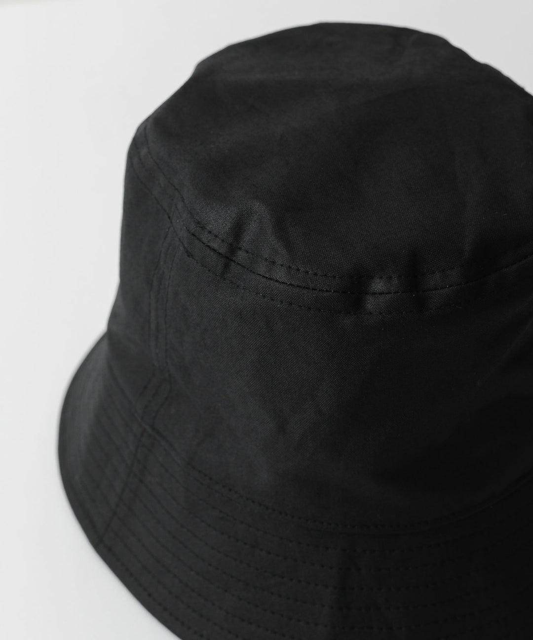 INTÉRIM(インテリム)のバケットハット UK OILED CLOTH BUCKET HAT - BLACK