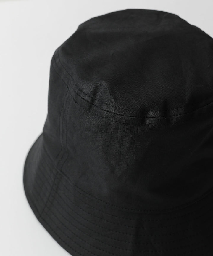 INTÉRIM(インテリム)のバケットハット UK OILED CLOTH BUCKET HAT - BLACK