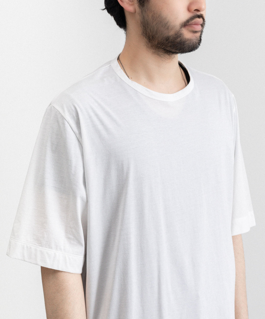 KANEMASA(カネマサ)の23SSコレクションのCOTTON THIN PACK TEE の WHITE×BLACK