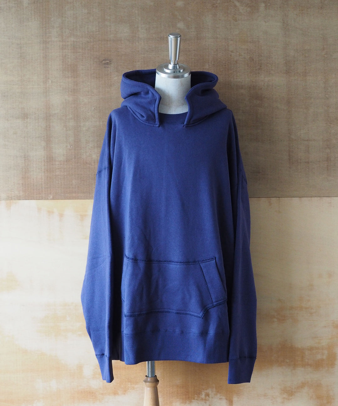 INTERIM(インテリム)の22AWコレクションのHYPER BIG LOOP WHEEL SIDE SEAMLESS AFTER HOODED SWEAT PARKAのNASU